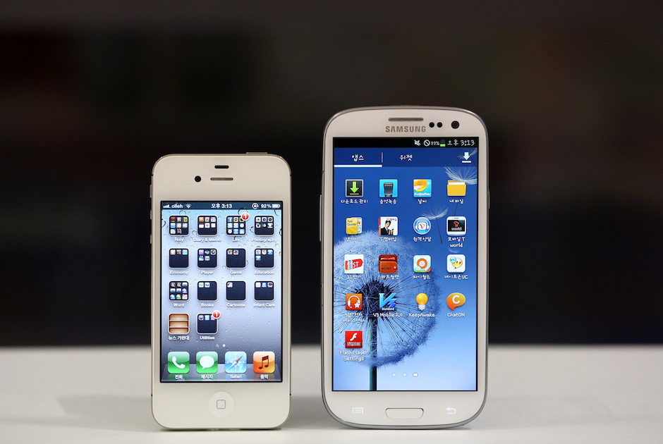 An iPhone and a Samsung Galaxy phone, side by side, in 2012 (Bloomberg photo)