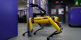 Image caption: Boston Dynamics' SpotMini opening a door. Via YouTube.